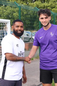 team captains shake hands after Blackwall FC v Hackney Wickers match.